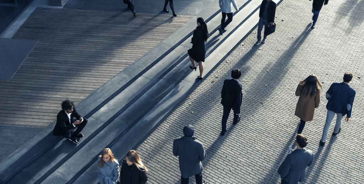 People walking together in a bright public space